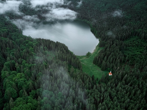 drone view of lake st ann in romania