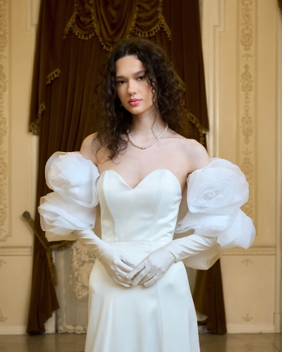 Elegant bridal fashion photography in a historic palace in Bucharest.