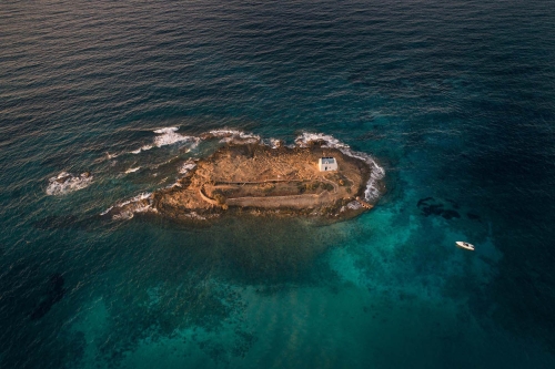 small church in the middle of sea close to malia