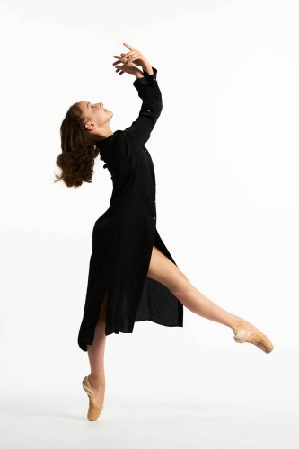 Contemporary dancer flowing seamlessly through a movement sequence.