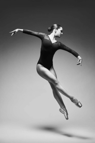 Close-up of a dancer’s intense focus during a routine.