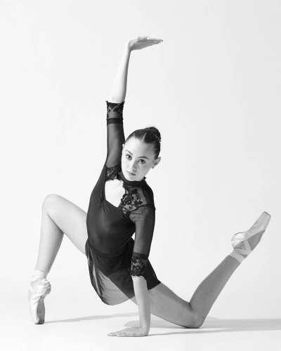 Close-up of ballet dancer en pointe, emphasizing technique.