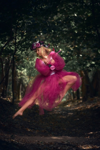 A dancer executing a powerful, high-energy jump.