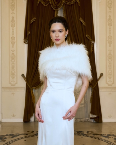 Fashion model in a bridal dress captured in a historic palace in Bucharest.