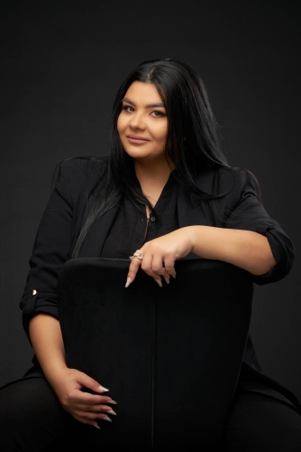 Artistic portrait of a woman with dramatic studio lighting