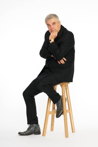 Classic studio portrait of a man with elegant lighting