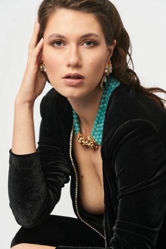 Close-up studio portrait of a woman with soft lighting