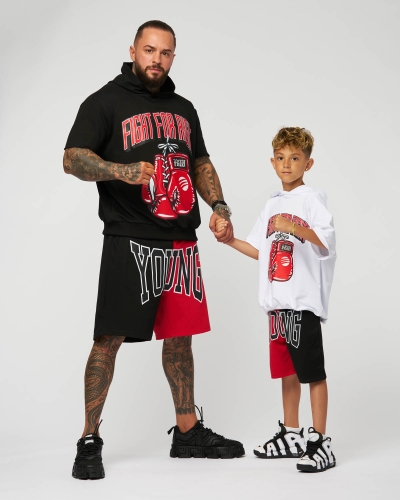 Fighter and his son posing in a studio for a streetwear fashion campaign in Bucharest.