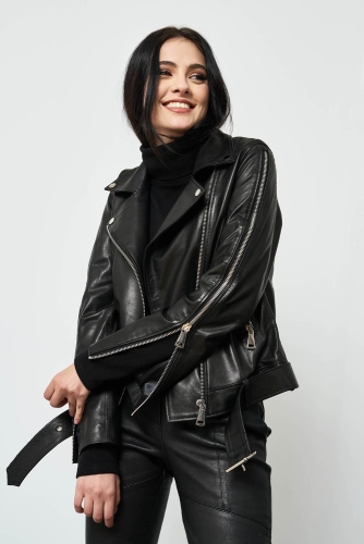 Timeless fashion portrait of a female model in a professional studio.